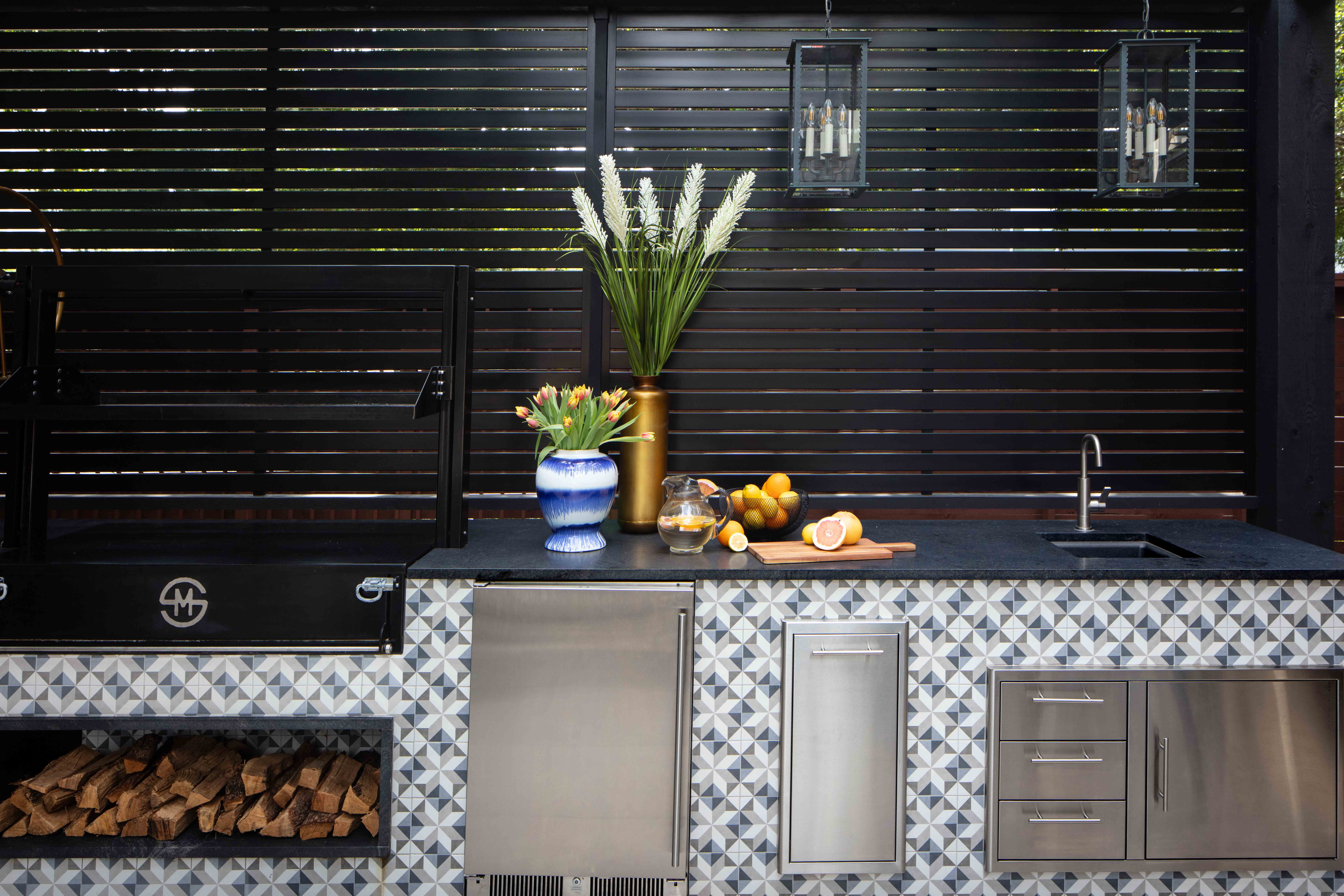 Outdoor kitchen with Santa Maria grill Houston — Matt Baker Contracting